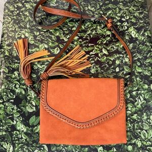 Stylish Tan Crossbody Bag with Tassel Details